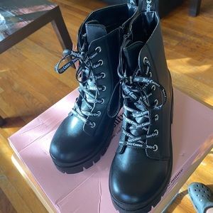 BRAND NEW Juicy Couture Combat boots. never worn. great Xmas present.